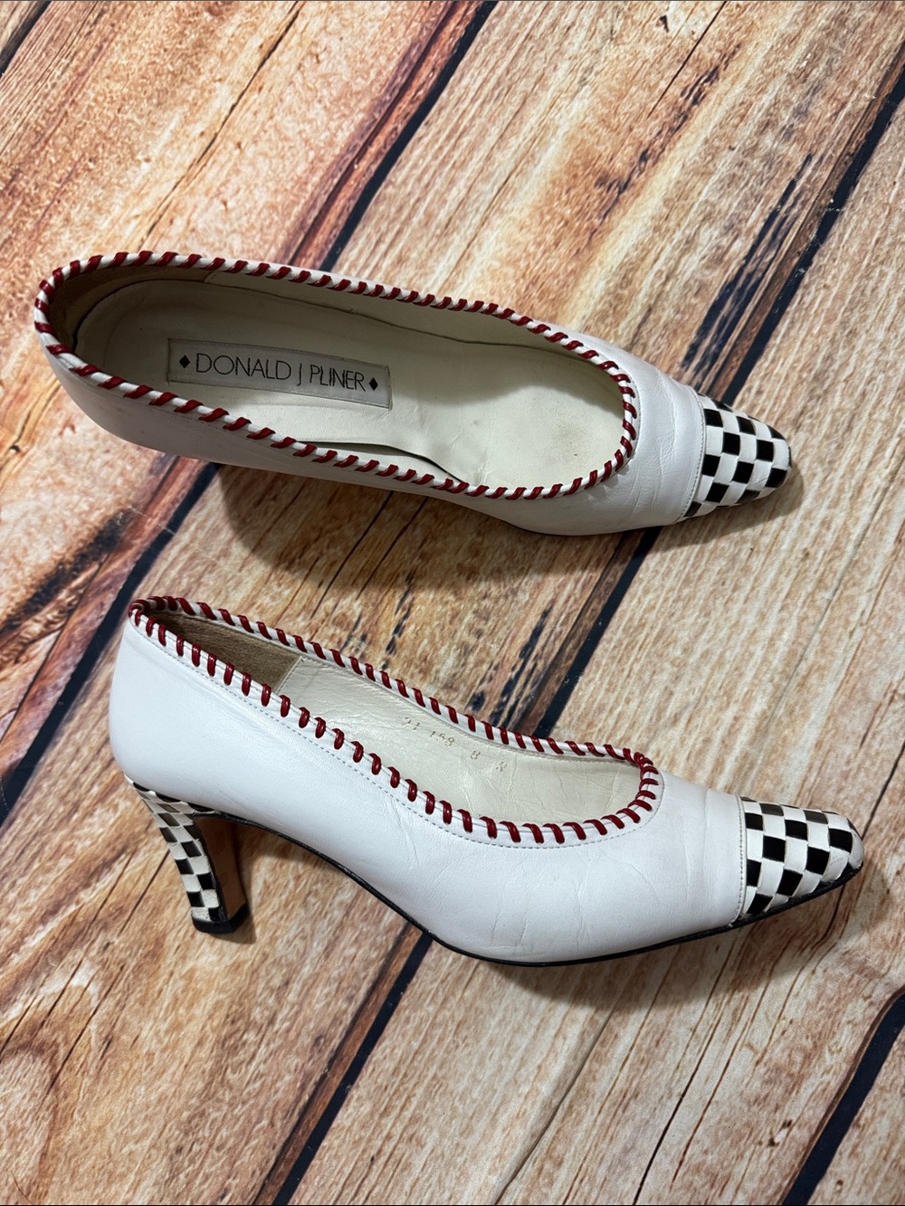 Donald J. Pliner White Pumps with Red Trim and Black-and-White Check Toe